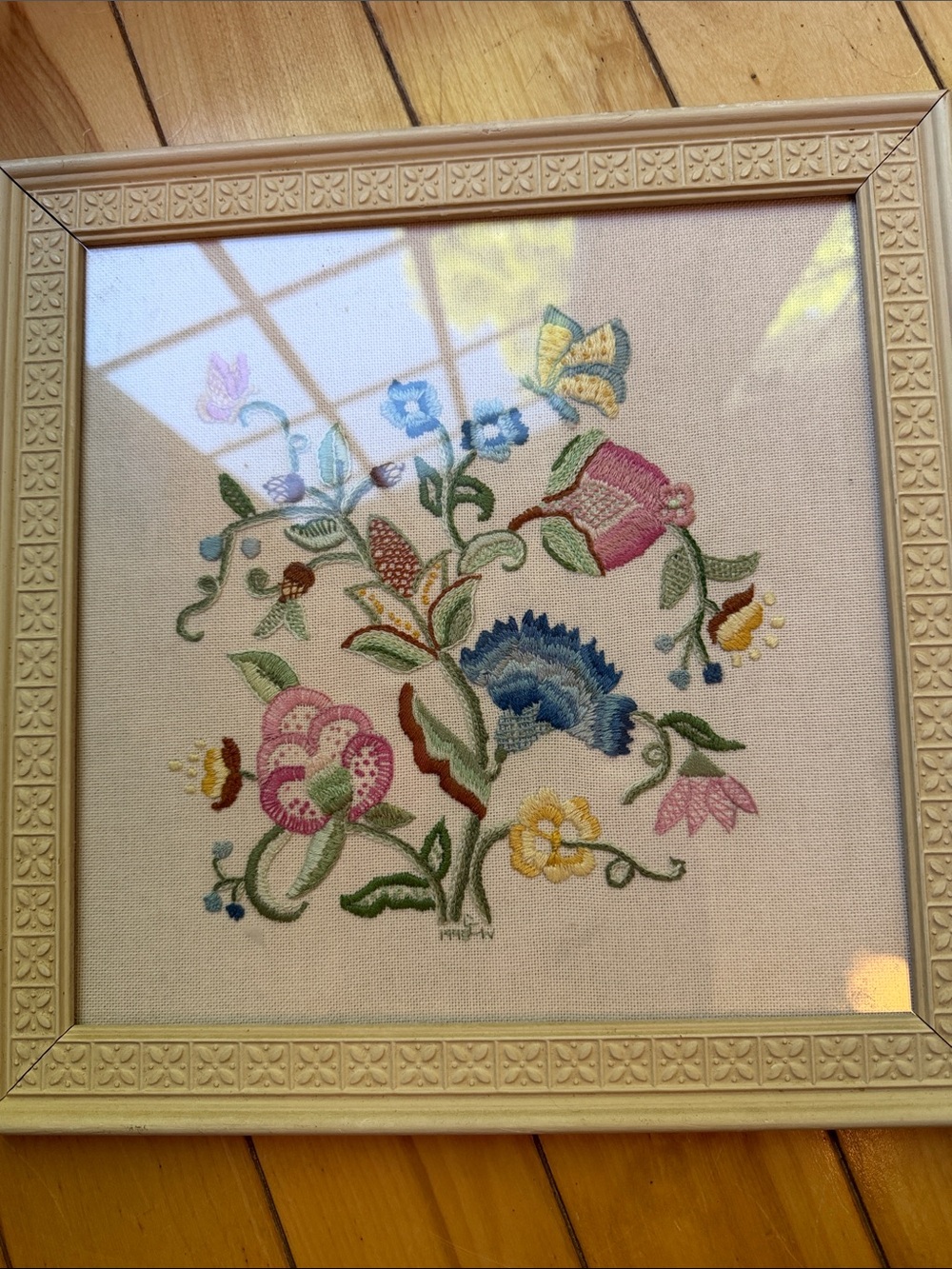 A vintage embroider flower wall art